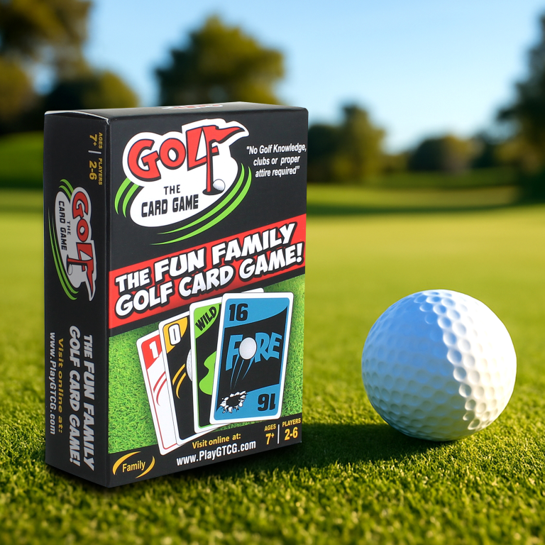 Golf the Card Game with Golf Ball on Golf Course Picture of Golf-themed Card game titled "Golf the card game" Box next to a golf ball on a grassy field.