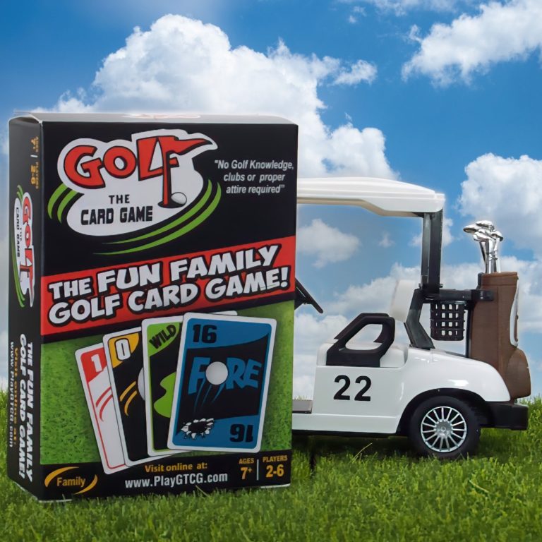 Golf the Card Game with Golf Cart Picture of Golf-themed Card game titled "Golf the card game" Box next to a golf cart on green grass.